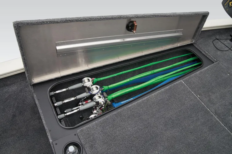 Slide: The Image of Manufacturer Provided Image: 2025 Tracker Pro Team 190 fishing rod storage compartment with multiple rods organized neatly. - 26