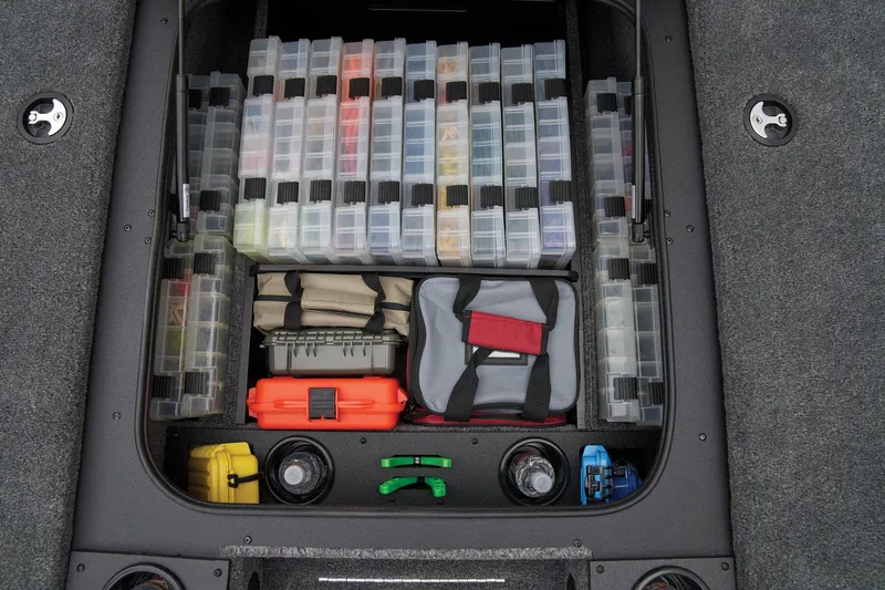 Slide: The Image of Manufacturer Provided Image: Storage compartment of 2025 Tracker Pro Team 190 boat with organized fishing gear and tackle boxes. - 27