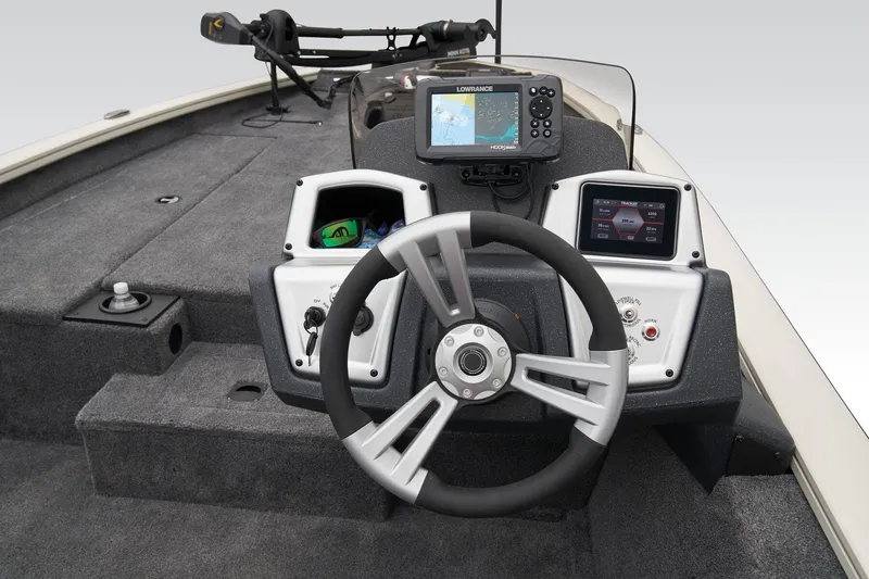 Slide: The Image of Manufacturer Provided Image: 2025 Tracker Pro Team 190 boat dashboard with steering wheel and electronic displays. - 29