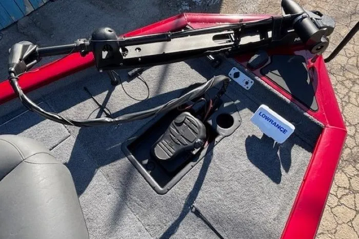 Slide: The Image of 2025 Tracker Pro Team 190 boat deck with trolling motor and Lowrance fish finder. - 7