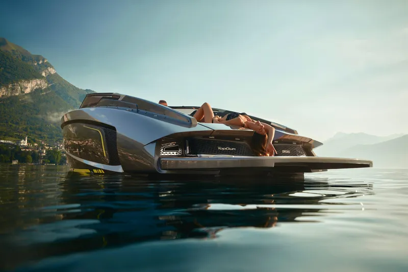 Slide: The Image of 2026 Flynt Yachts Centura 32 on serene water with scenic mountain backdrop. - 14