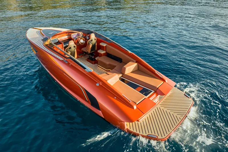 Slide: The Image of 2026 Flynt Yachts Centura 32 luxury boat cruising on clear blue water. - 8