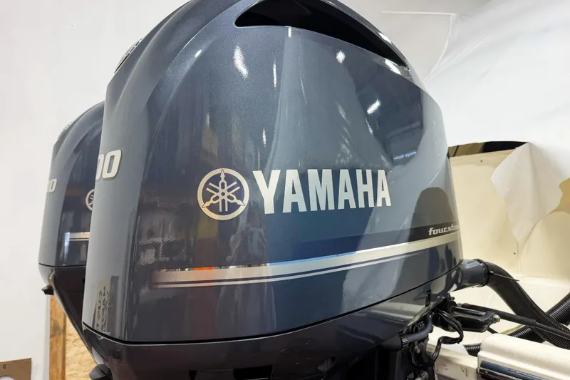 Slide: The Image of Yamaha outboard motor on 2007 Pursuit OS 335 Offshore boat, close-up view. - 19