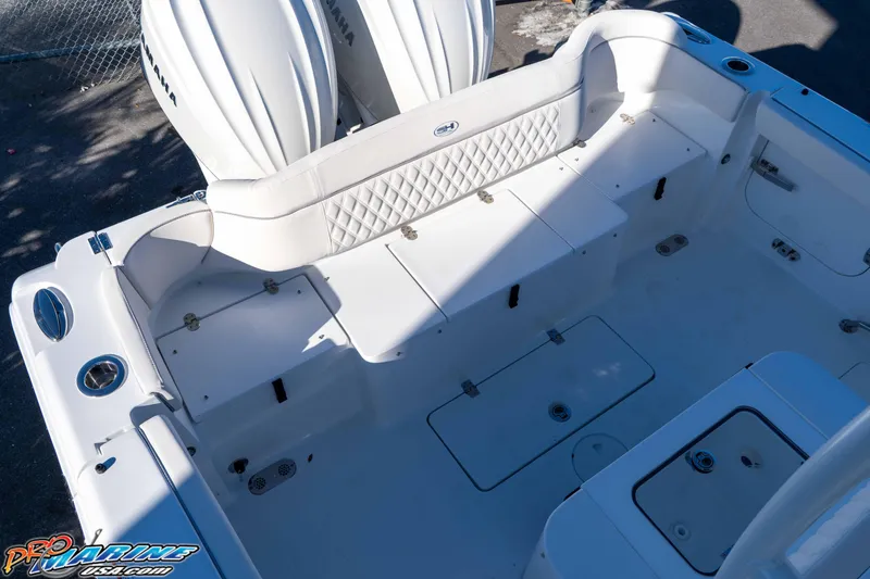 Slide: The Image of 2026 Sea Hunt Ultra 285 Coffin Box boat interior with Yamaha engines, featuring spacious seating. - 15