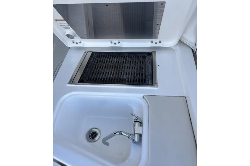 Slide: The Image of Control panel of 2020 Pursuit DC 365 Dual Console with Garmin display and various switches. - 10