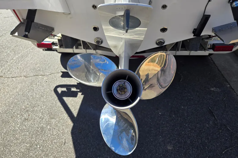 Slide: The Image of 2024 Aquasport 2100 Center Console boat propeller, close-up view. - 25