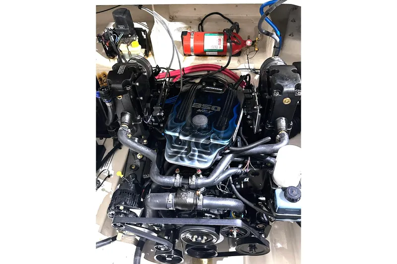Slide: The Image of Engine compartment of a 2007 Sea Ray Sundancer 260 boat, featuring a 350 MAG engine. - 17