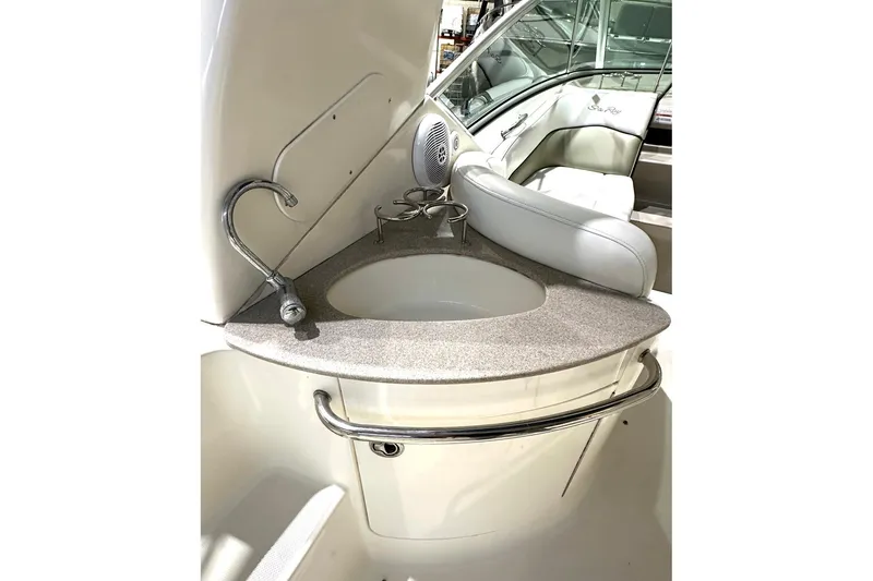Slide: The Image of 2007 Sea Ray Sundancer 260 boat interior with sink and seating area. - 6