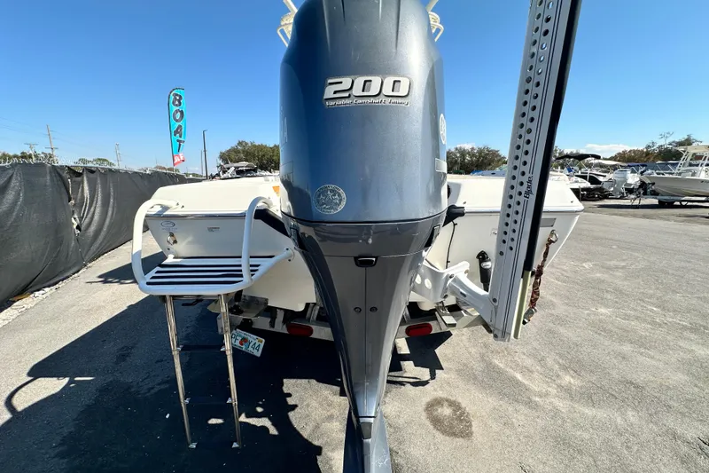 Slide: The Image of 2016 Skeeter SX2250 boat with 200 horsepower engine, parked outdoors. - 16