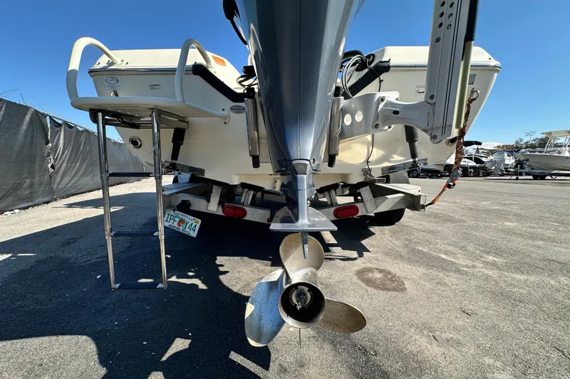 Slide: The Image of 2016 Skeeter SX2250 boat rear view with propeller and ladder. - 17