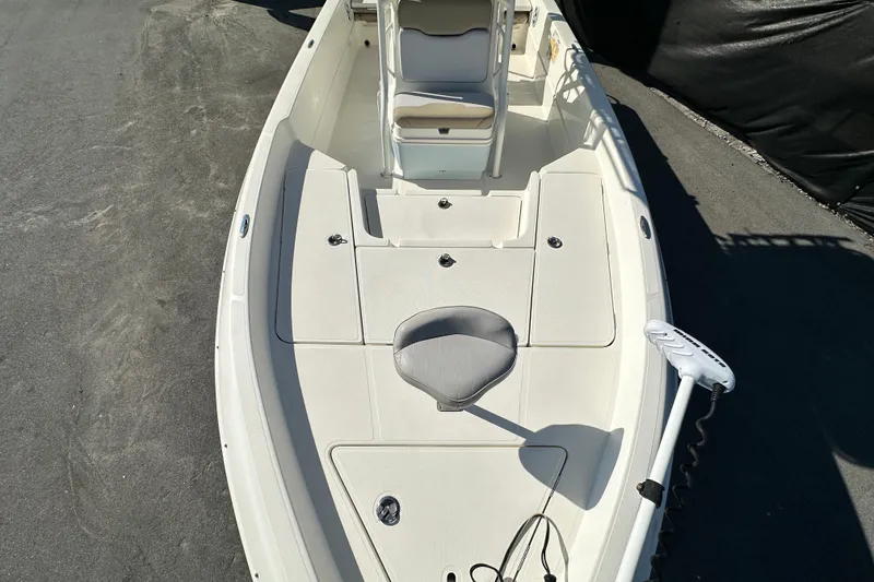 Slide: The Image of 2016 Skeeter SX2250 boat deck with seating and trolling motor, viewed from above. - 57