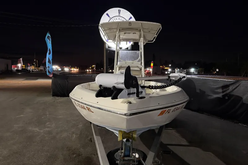 Slide: The Image of 2016 Skeeter SX2250 boat on trailer in outdoor lot. - 6