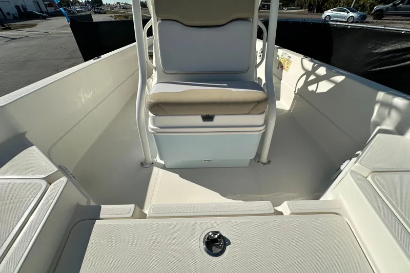 Slide: The Image of 2016 Skeeter SX2250 boat interior with seating and storage compartments. - 62