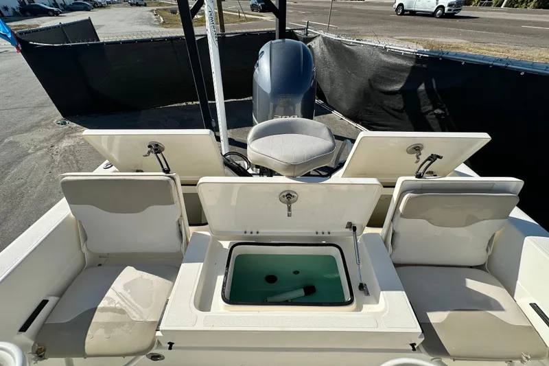 Slide: The Image of 2016 Skeeter SX2250 boat interior with open storage compartments and seating. - 72