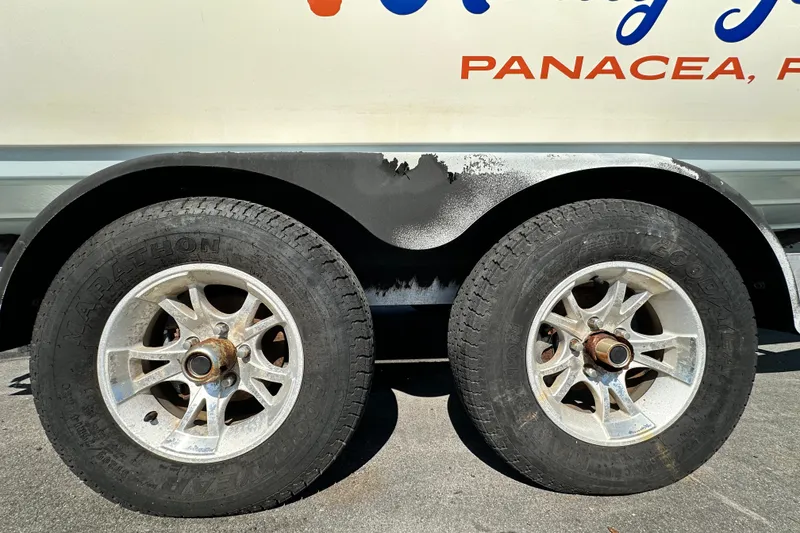 Slide: The Image of Trailer wheels of a 2016 Skeeter SX2250 boat in Panacea, Florida. - 77