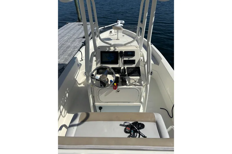 Slide: The Image of 2016 Skeeter SX2250 boat on trailer under clear blue sky. - 9