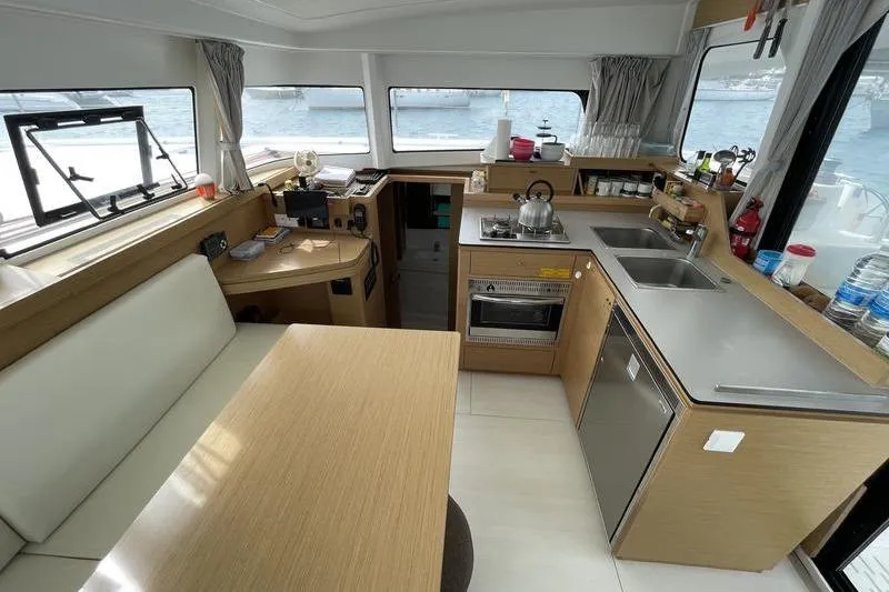 Slide: The Image of Interior of 2022 Excess 11 yacht with modern kitchen and dining area. - 25