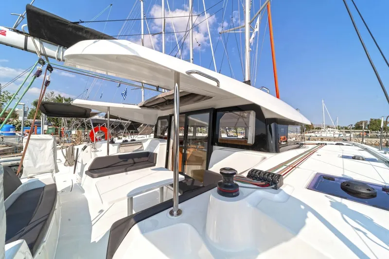 Slide: The Image of 2022 Excess 11 yacht with sleek design, spacious deck, and modern amenities. - 4