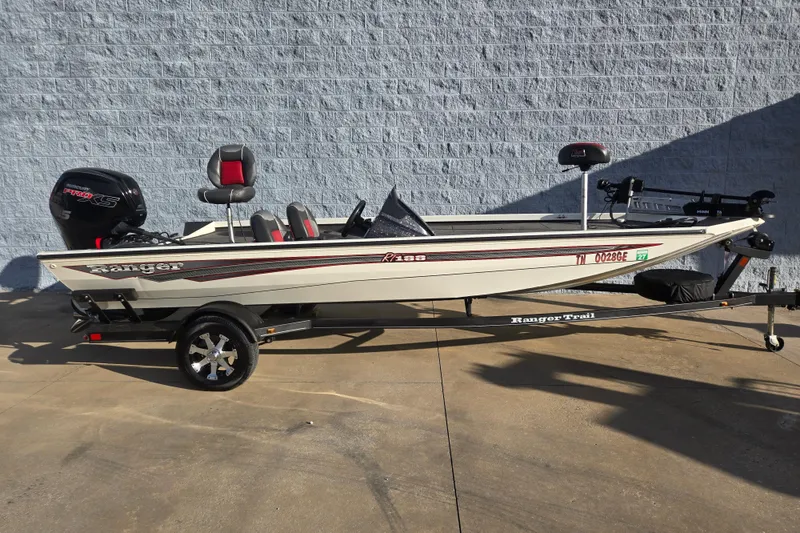 The Image of 2017 Ranger RT188 fishing boat on trailer, featuring sleek design and powerful motor. - 1