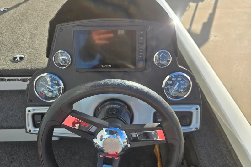 Slide: The Image of 2017 Ranger RT188 boat dashboard with Garmin display and gauges. - 5