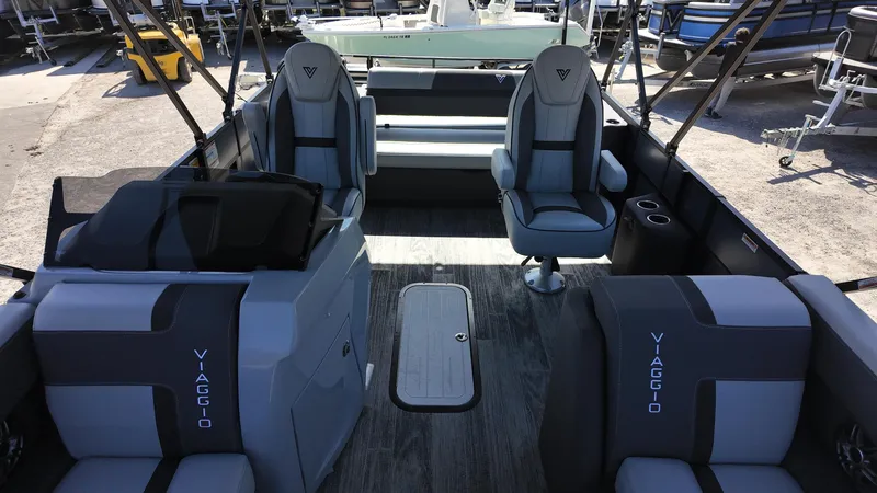 Slide: The Image of Interior of 2025 Viaggio X22S boat with modern seating and sleek design. - 10