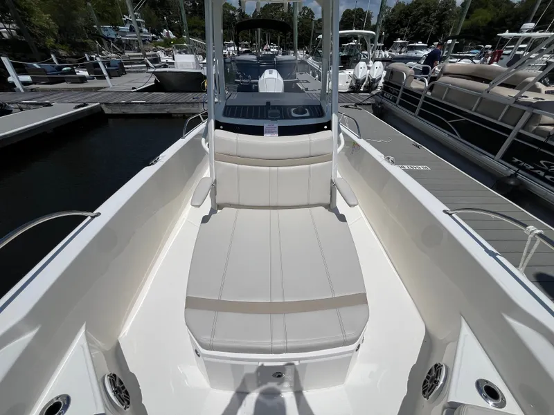 Slide: The Image of Boston Whaler 250 Dauntless 2026 at dock, interior view. - 27