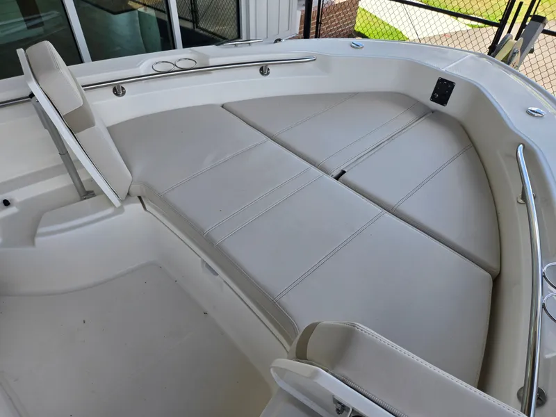 Slide: The Image of Interior of 2026 Boston Whaler 250 Dauntless with comfortable seating cushions. - 17