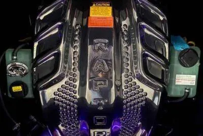 Slide: The Image of 2025 Tigé Ultré 25ZX engine with Raptor branding, showcasing sleek design and advanced technology. - 10