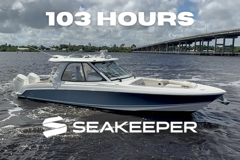 The Image of 2023 Boston Whaler 380 Realm on water, 103 hours, Seakeeper logo visible. - 0