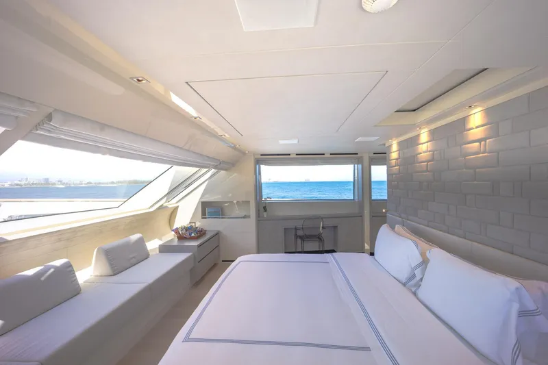 Slide: The Image of Luxurious Sanlorenzo SD112 yacht bedroom with ocean view, modern decor, and elegant furnishings, 2019 model. - 19