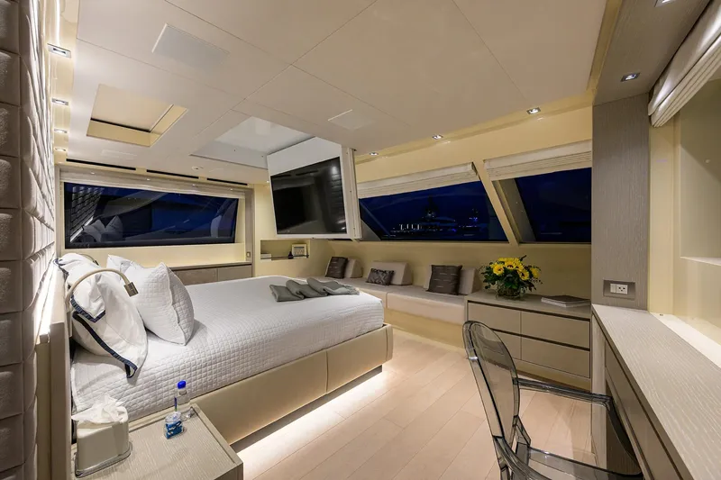 Slide: The Image of Luxurious 2019 Sanlorenzo SD112 yacht bedroom with modern decor and large windows. - 21