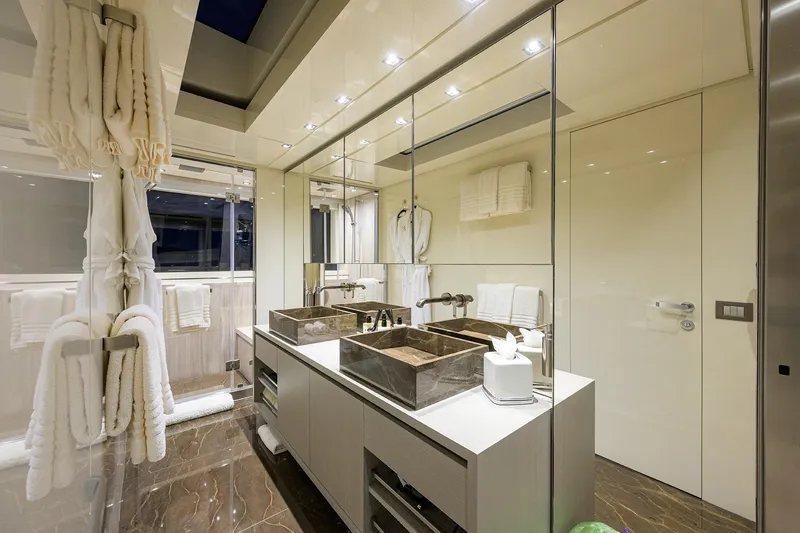 Slide: The Image of Luxurious bathroom on 2019 Sanlorenzo SD112 yacht with dual sinks and elegant decor. - 23