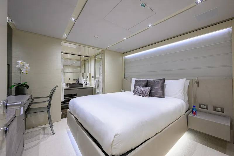 Slide: The Image of Luxurious bedroom interior on 2019 Sanlorenzo SD112 yacht, featuring modern design and elegant decor. - 25