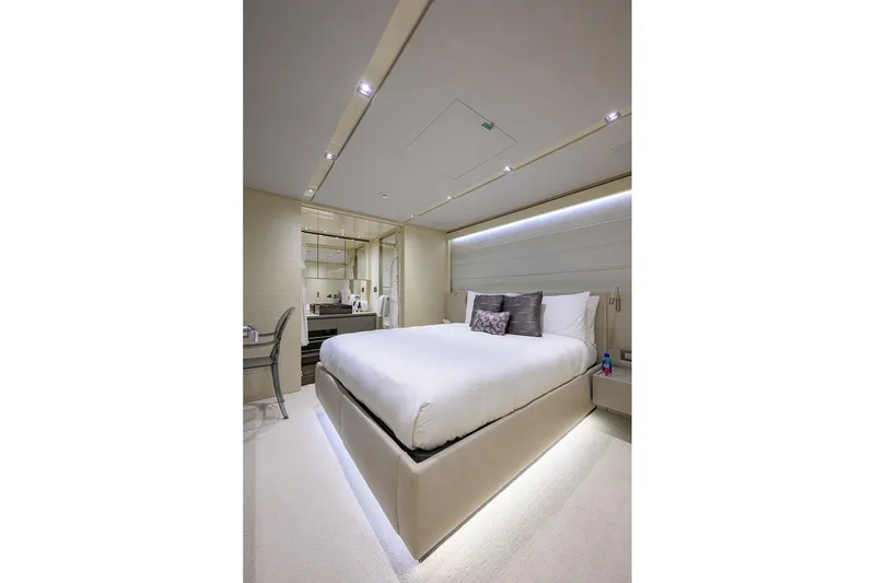 Slide: The Image of Luxurious bedroom interior on 2019 Sanlorenzo SD112 yacht, featuring modern design and ambient lighting. - 28