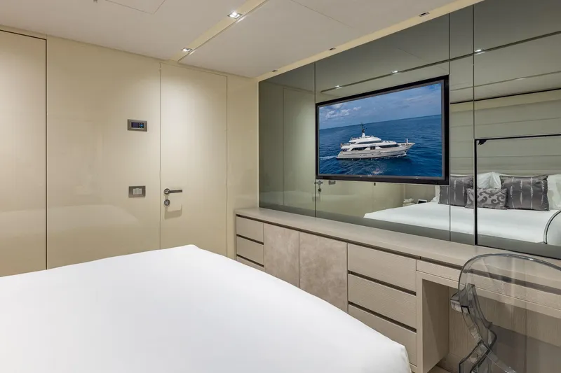 Slide: The Image of Luxurious Sanlorenzo SD112 yacht bedroom interior with modern decor and wall-mounted TV, 2019 model. - 45