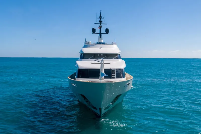 Slide: The Image of Sanlorenzo SD112 yacht, 2019 model, cruising on clear blue ocean waters. - 5