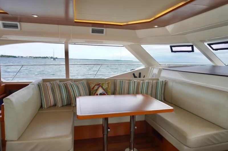Slide: The Image of Luxurious interior of 2017 Aquila 44 Yacht with ocean view and cozy seating area. - 25