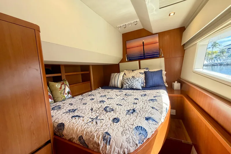 Slide: The Image of Luxurious cabin interior of 2017 Aquila 44 Yacht with nautical-themed bedding. - 33