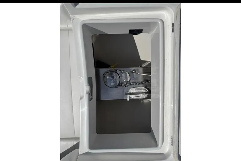 Slide: The Image of Anchor storage compartment on 2018 Regulator 34 Center Console boat. - 15