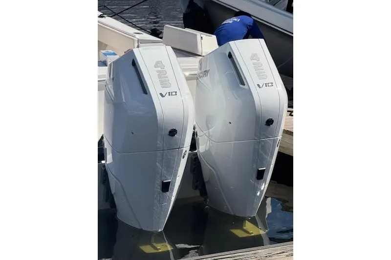 Slide: The Image of Twin Yamaha 425 V8 outboard engines on a 2018 Regulator 34 Center Console boat. - 4