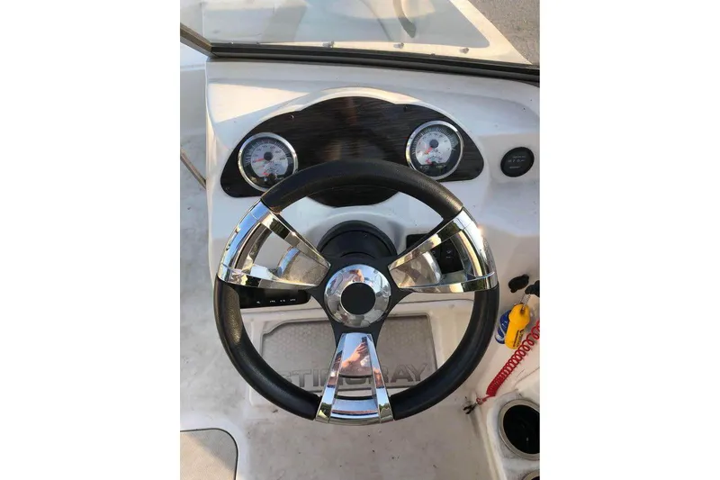 Slide: The Image of Steering wheel and dashboard of 2019 Stingray 191 LX boat. - 4