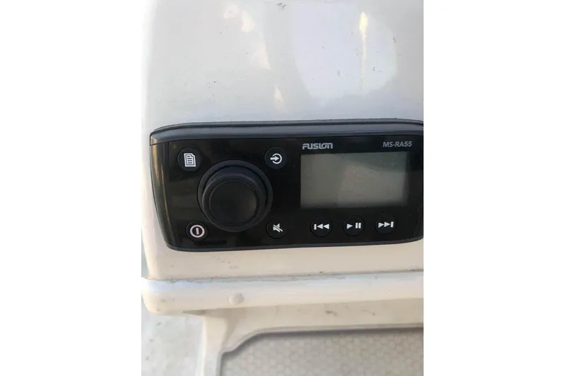 Slide: The Image of Fusion MS-RA55 stereo system on 2019 Stingray 191 LX boat dashboard. - 5