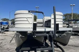 Slide: The Image of 2022 Godfrey Sweetwater 2286 C pontoon boat on trailer, outdoor display. - 3