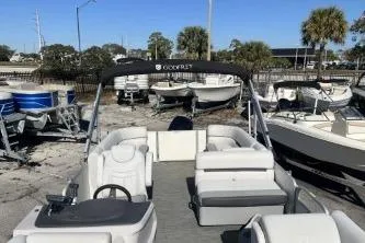 Slide: The Image of 2022 Godfrey Sweetwater 2286 C pontoon boat with spacious seating and canopy. - 9