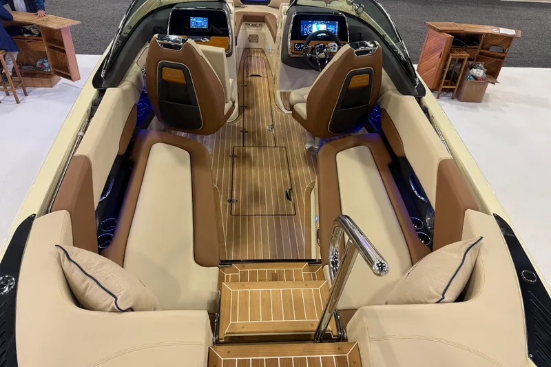 Slide: The Image of 2026 Chris-Craft Launch 27 interior with luxurious seating and modern dashboard. - 18