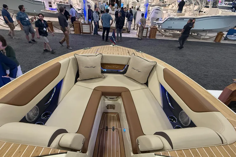 Slide: The Image of Luxurious interior of 2026 Chris-Craft Launch 27 boat at a boat show. - 24