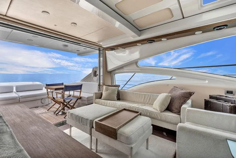 Slide: The Image of Luxurious interior of 2006 Azimut 68S yacht with ocean view and elegant seating. - 27