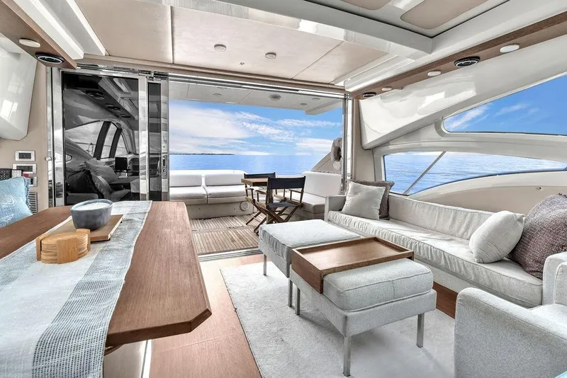 Slide: The Image of Luxurious interior of 2006 Azimut 68S yacht with ocean view and elegant furnishings. - 29