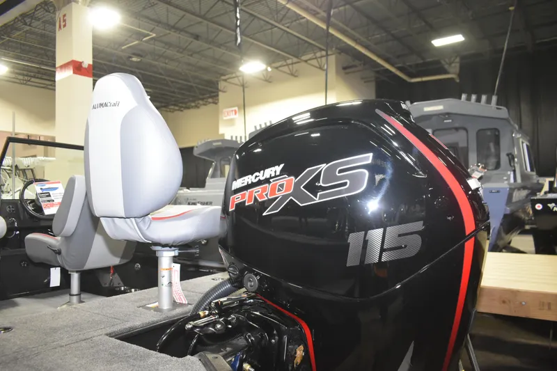 Slide: The Image of 2026 Alumacraft Trophy 175X Sport with Mercury Pro XS 115 engine in showroom. - 18