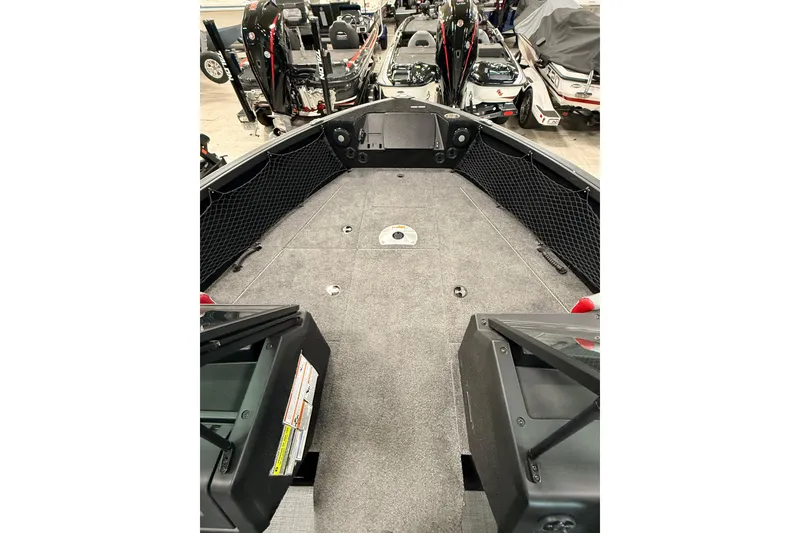 Slide: The Image of 2025 Alumacraft Trophy 175X Sport boat interior with spacious deck and storage compartments. - 20